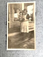Vintage Snapshot Photograph Of Woman With Doll picture
