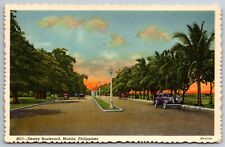 Dewey Boulevard Manila Philippines Palm Trees Classic Old Cars Greeting Postcard picture