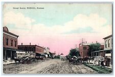 1909 View Of Street Scene Russell Kansas KS, Dirt Road Horse Carriage Postcard picture