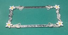Vintage Chrome License Plate Frame w/ White Flowers on Corners Great Condition picture