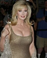 MORGAN FAIRCHILD - IN A CLEAVAGE SHOWING DRESS  picture