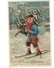 c1900 Happy Christmas Cute Boy Ski Carrying Tree Postcard UNPOSTED picture
