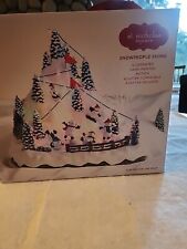 St Nicholas Square Village Snowpeople Skiing Lighted picture