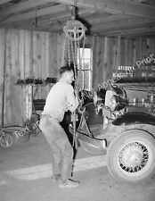 1940 Garage Owner Hoisting a Car, Pie Town, NM Old Photo 8.5