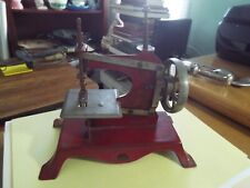 CASIGE RED TOY/CHILD'S SEWING MACHINE ANTIQUE GERMANY EAGLE EMBLEM TOLEWARE picture