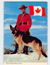 Postcard Royal Canadian Mounted Police with Dog & Flag of Canada picture