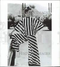 1974 Press Photo Woman models Cole of California's black & white stripe pajamas picture