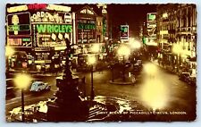 Postcard Night Scene of Piccadilly Circus, London hand-colored 1957 RPPC H186 picture