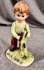 1970's Hand-Painted Figurine of a Young Boy Pruning Flowers 5.25