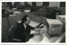 1990 Press Photo Bernie Anderalli Working at Marine Midland Retail Credit Office picture