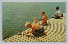 Postcard Three Boys Fishing off Dock picture