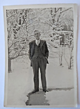 Vintage Black & White Photograph, Gentleman in a Suit on a Snowy Day picture