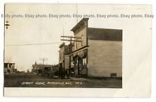 Wagon, stores, street scene, Pittsville, Wisconsin; photo postcard RPPC % picture