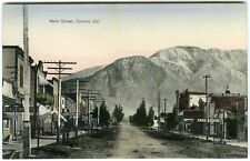 c.1910 UPLAND CALIFORNIA MAIN STREET w/NEWS DEPOT,LIVERY STABLES~UNUSED POSTCARD picture