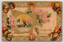 1910 Thanksgiving Greeting Snowy Cottage Pumpkin & Fruit Border Art Postcard picture