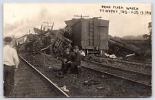 Fort Wayne~2 Passengers Sit on Luggage~Penn Flyer~Freight Train Wreck RPPC 1911 picture