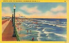1946 NEW JERSEY POSTCARD: LOOKING ALONG THE BOARDWALK, WILDWOOD BY THE SEA, NJ picture