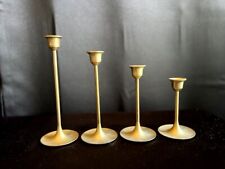 VINTAGE BRASS SET Of 4 GRADUATED CANDLESTICKS picture