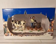 Heartland Valley Village Accessory Cows Pulling Sled Man Milk picture