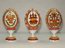 Wooden painted Ukrainian pysanky Easter eggs . Аuthor's painting on the stand picture