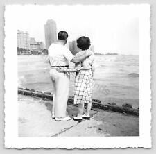 1940s Photo Of A Man And Woman Looking At The Ocean Black And White picture