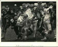 1987 Press Photo Westhill HS football player #23 runs against Mexico HS defender picture