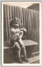RPPC Cute Curly Hair Little Girl With Baby Doll c1930 Real Photo Postcard S30 picture