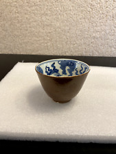 A Chinese vintage red-glazed porcelain cup with blue & white paintings inside picture