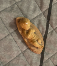 Small Wooden Baby Jesus Laying Down picture