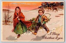 Postcard Christmas - Children Cutting Down Tree - Embossed 1908 picture