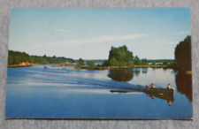 Vintage Postcard: Canoeing Across a Lake's Smooth Surface picture