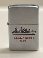 VINTAGE 1958 U.S.S. CAPRICORNUS AKA-57 NAVY ZIPPO LIGHTER PATENT 2517191 picture