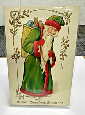 Tuck's Postcard Christmas Santa Green Long Robe Embossed Toys Circa 1909 Antique picture