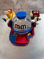 M&M - COLLECTIBLE CANDY DISPENSER FEATURING RED AND YELLOW picture