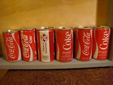 Set Of Seven Vintage Coke Cans Take A Look picture