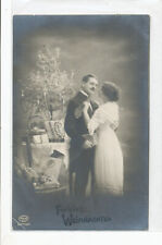 Real Photo Postcard - Christmas - Young Couple -Xmas Tree & Presents picture