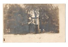 RPPC Real Photo Postcard - Street scene, two ladies standing beside house, trees picture