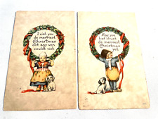 Christmas Set of Two 'Dutch' Children with Dogs and Wreaths Postcards, 1915 picture