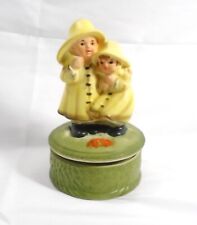Vintage JAPAN Music Box Boy and Girl with Raincoats picture