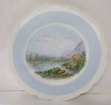 Vintage Blue Rim Decorative Plate with Cabin on a Lake Scene picture