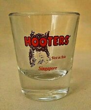 HOOTERS SHOT GLASS SINGAPORE FIRST IN ASIA BAR BARWARE LIBBEY ORANGE OWL LOGO. picture