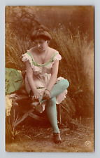 RPPC Colorized Woman on Bench Tying Shoes Real Photo, Antique B4 picture