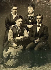 1800s Tintype Photograph of Victorian Era Family Posing For a Studio Portrait picture