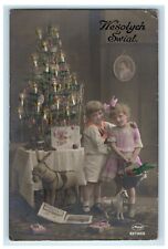 c1920's Christmas Children Rocking Horse Tint Candle Tree RPPC Photo Postcard picture