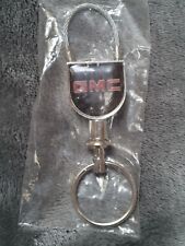 Vintage  Dealer GMC  cable top keychain with plunger release bottom ring... picture