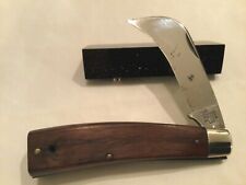 Schrade Walden 136 Hawkbill pocket knife with walnut handles picture