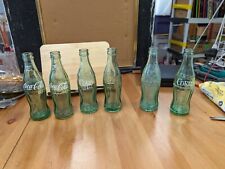 Set Of Six Vintage Coca Cola Bottles picture