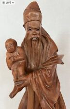 Carved Wood- Old Chinese Man Holding a Child picture