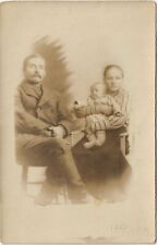 RPPC of Family w/Infant Looking Sad Unposted c1901 Real Photo Postcard picture