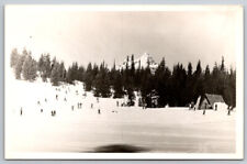 View of Crowd Skiing and Scenic Mountain in the Background RPPC Postcard picture